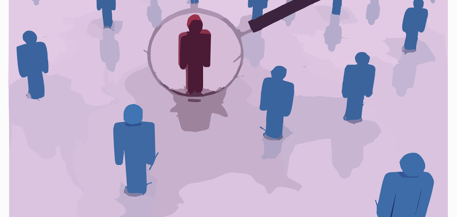 Bild mit Menschen und einer Lupe