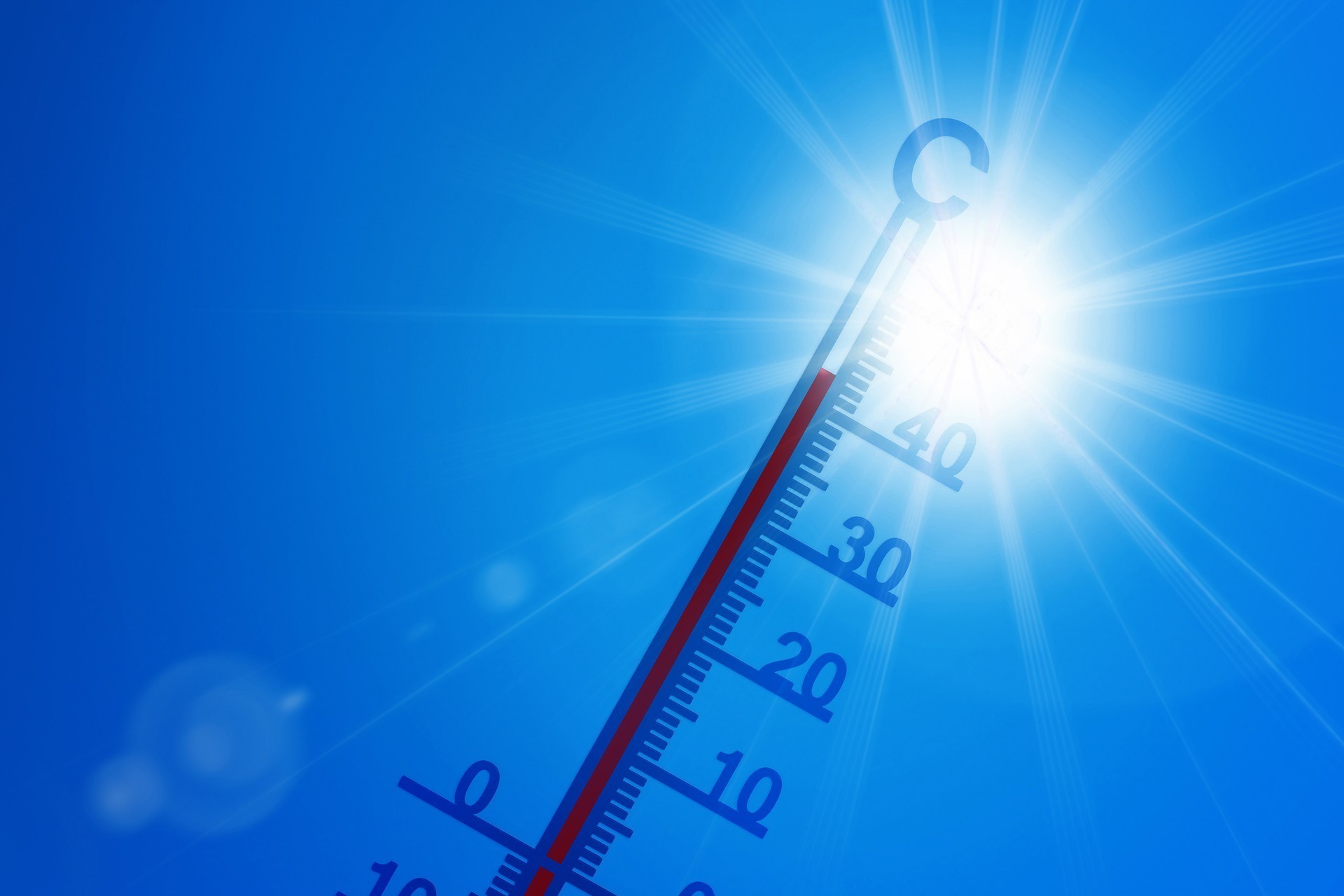 Bild: Sonne und Thermometer
