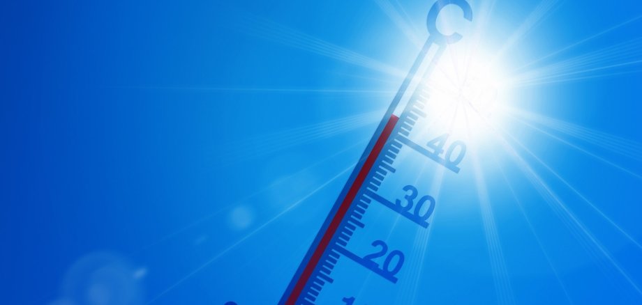 Bild: Sonne und Thermometer
